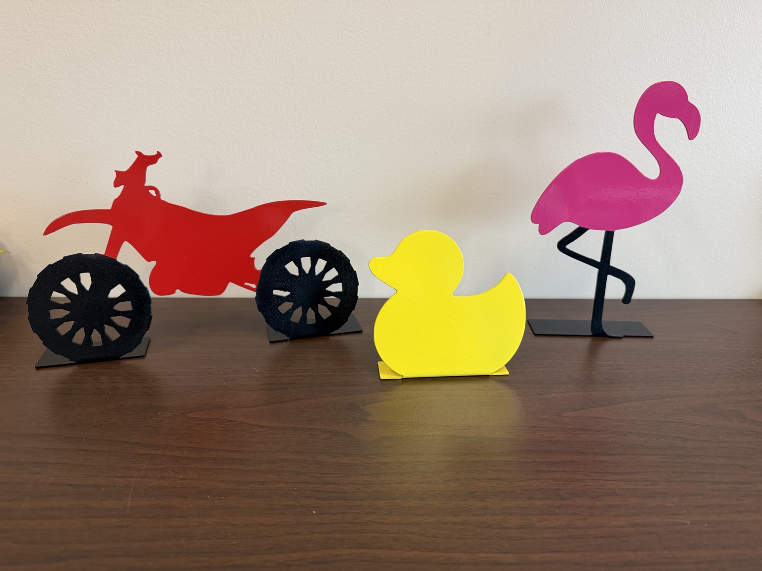 Colorful ATV, duck and flamingo metal decor