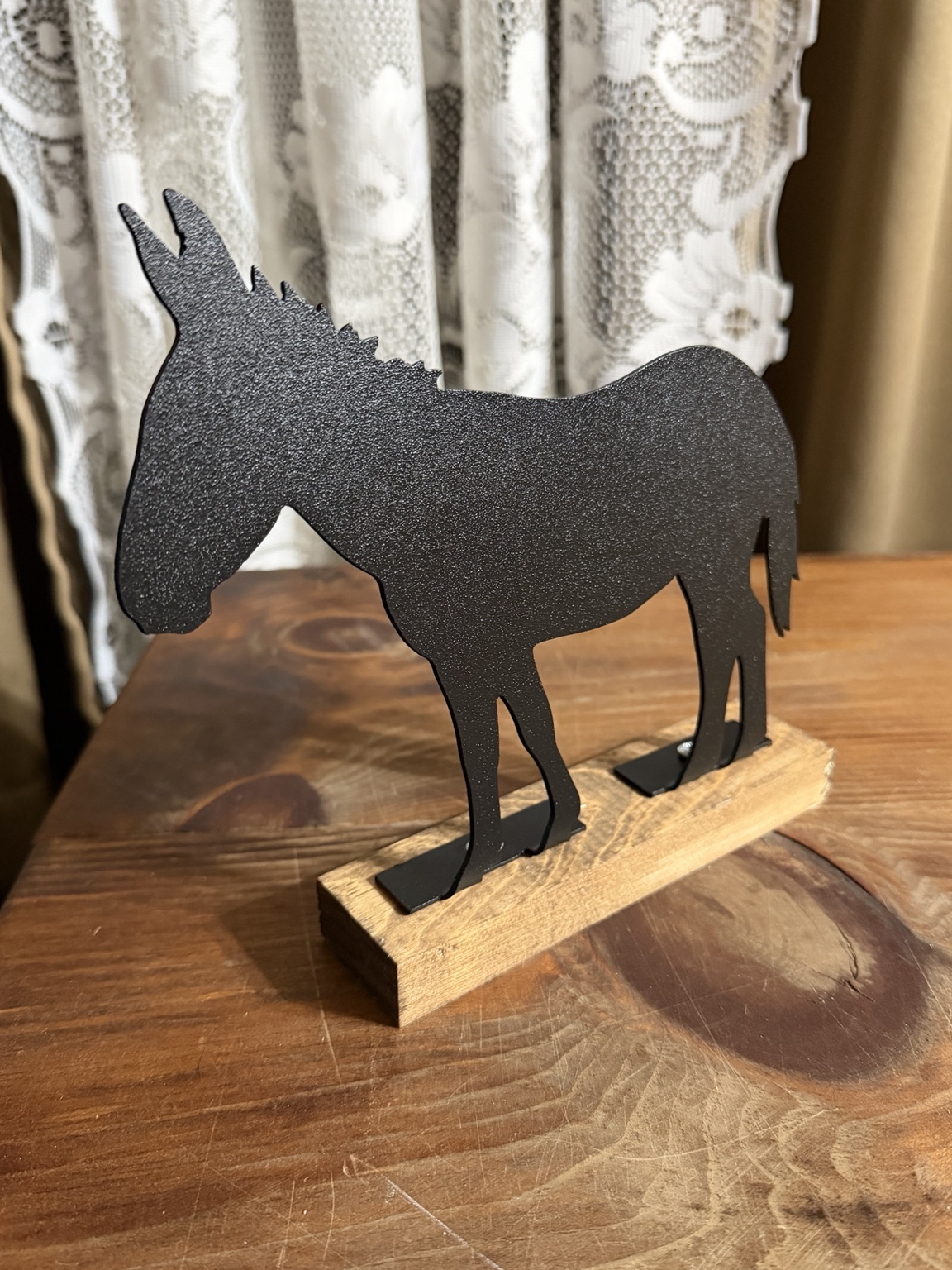 Black powder-coated donkey tabletop decor