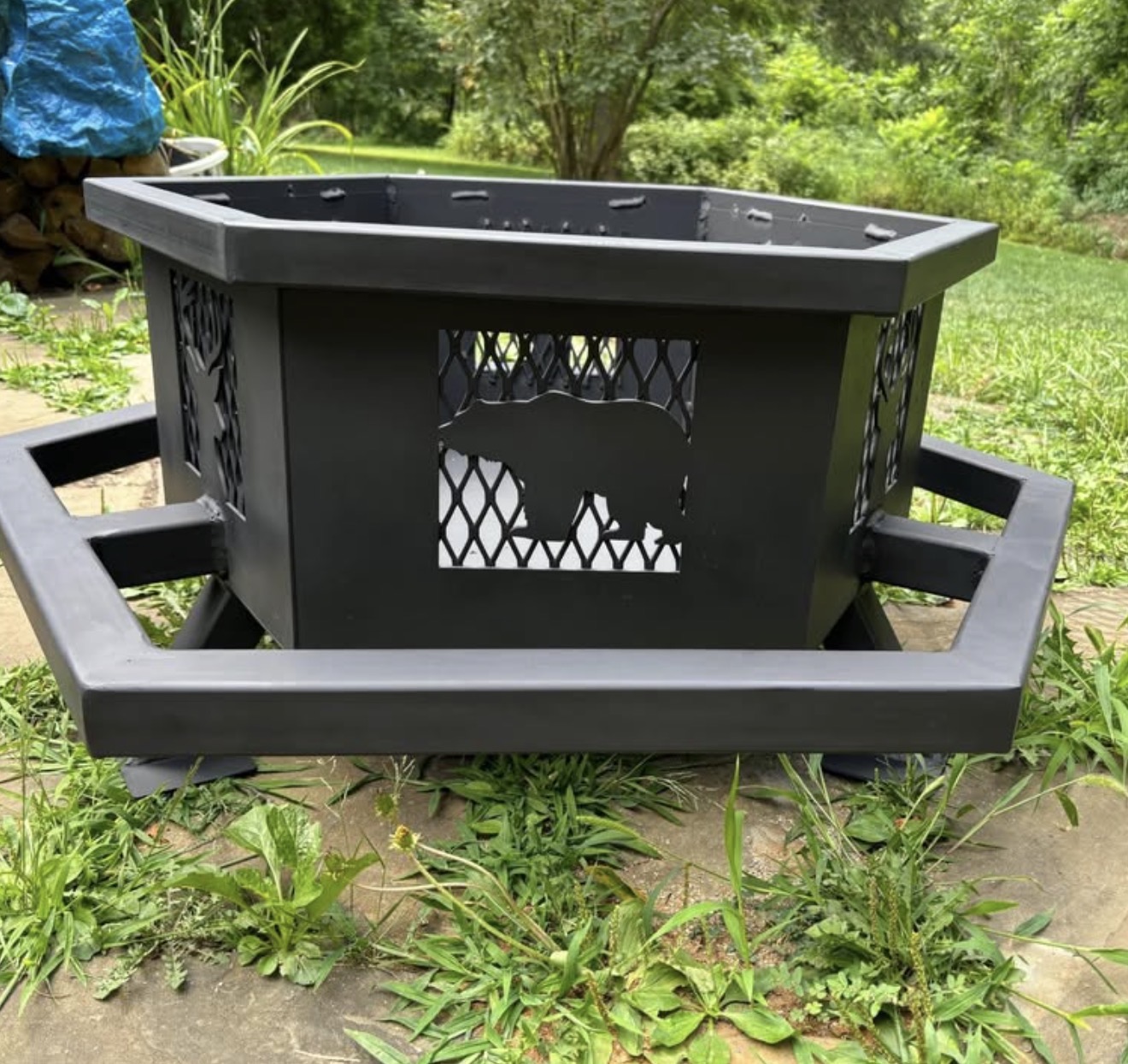 Custom hexagonal fire pit with bear design