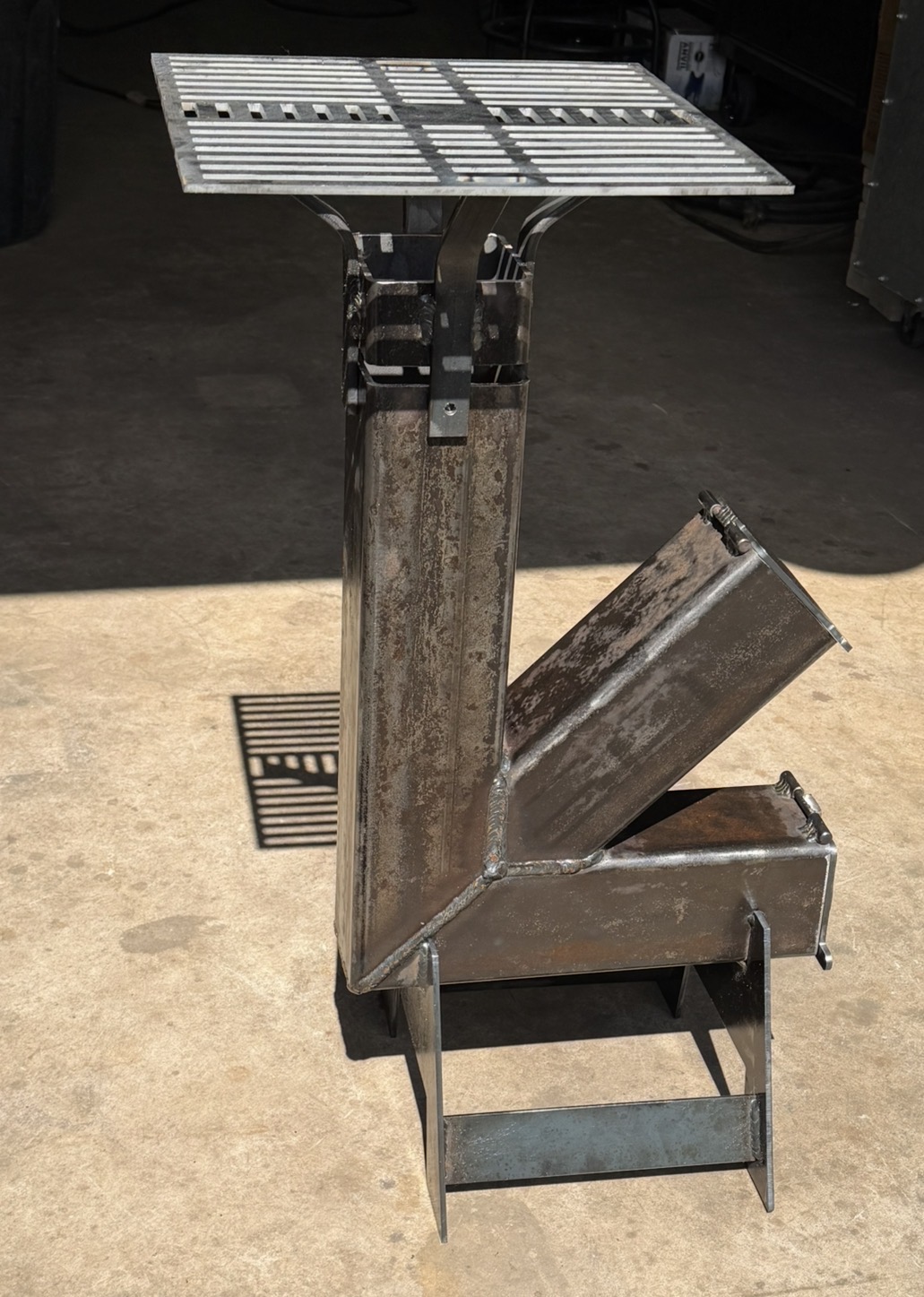 Heavy-duty portable rocket stove by MMC Metalworks
