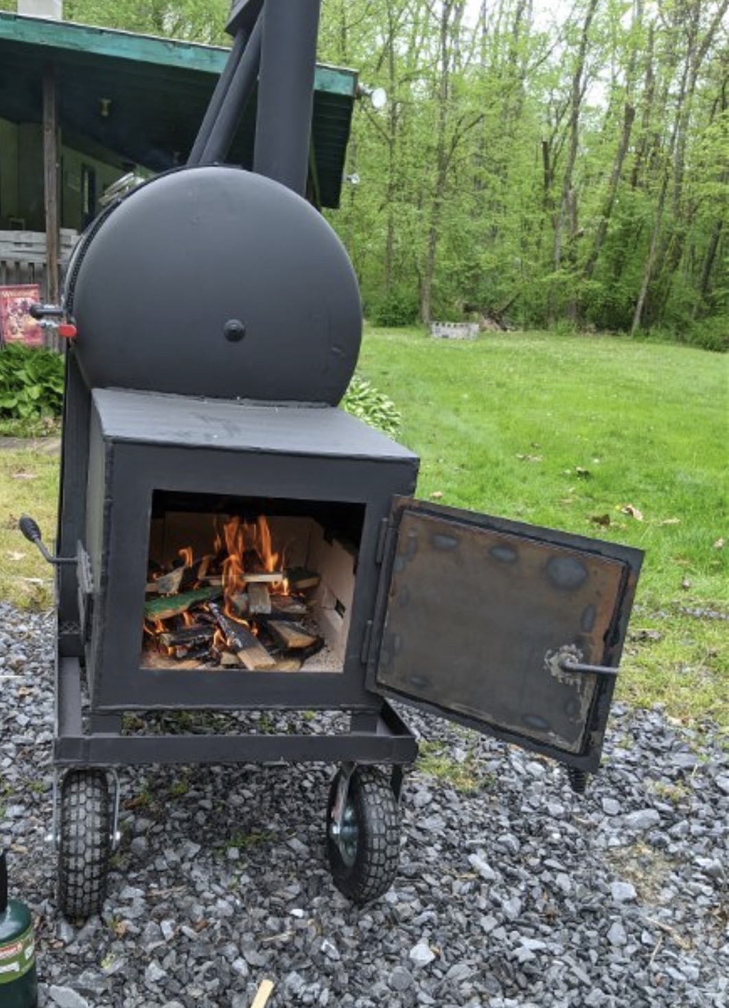 Lit firebox on a custom offset smoker